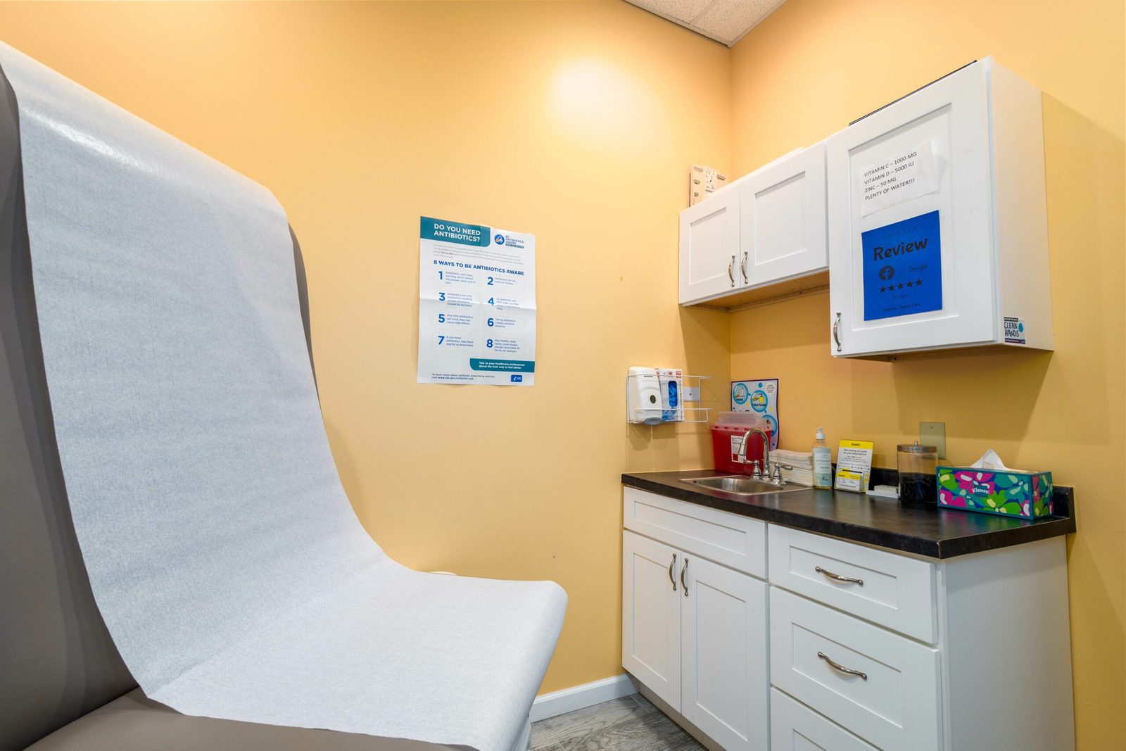 An exam room with lab draw station at Superior Urgent Care